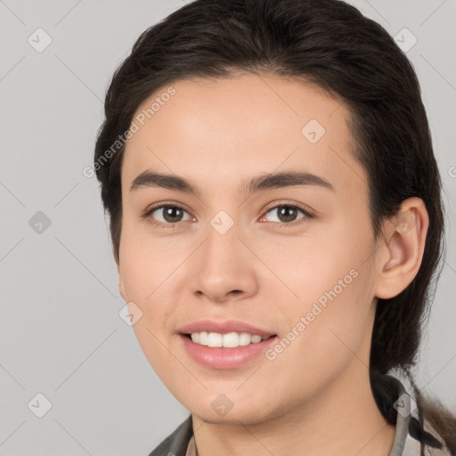 Joyful white young-adult female with medium  brown hair and brown eyes