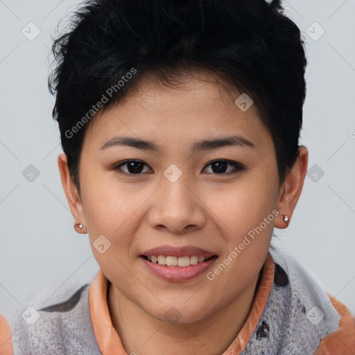 Joyful asian young-adult female with short  brown hair and brown eyes