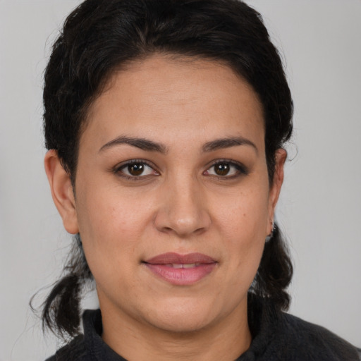 Joyful white young-adult female with medium  brown hair and brown eyes
