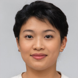 Joyful asian young-adult female with short  brown hair and brown eyes