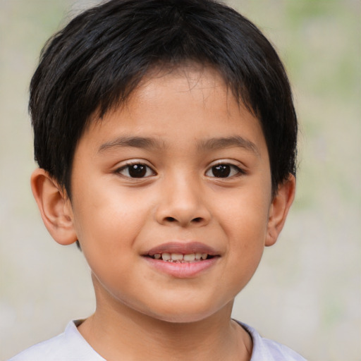 Joyful latino child female with short  brown hair and brown eyes