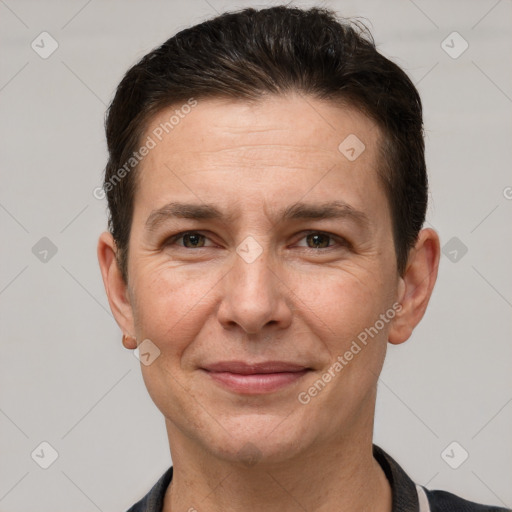 Joyful white adult male with short  brown hair and grey eyes