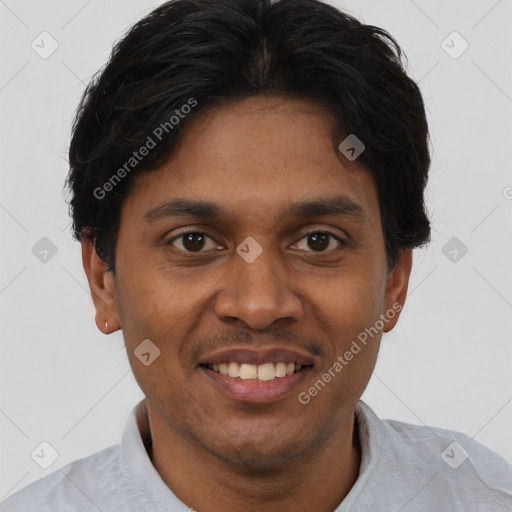 Joyful black young-adult male with short  brown hair and brown eyes