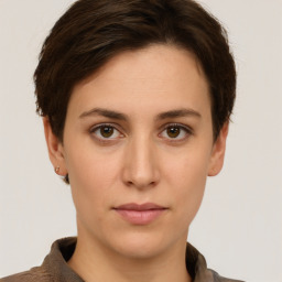 Neutral white young-adult female with short  brown hair and brown eyes