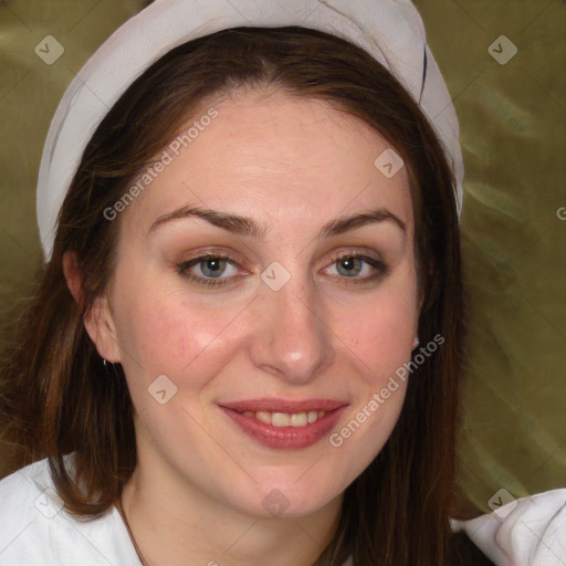 Joyful white young-adult female with medium  brown hair and blue eyes