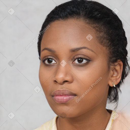 Neutral black young-adult female with short  black hair and brown eyes