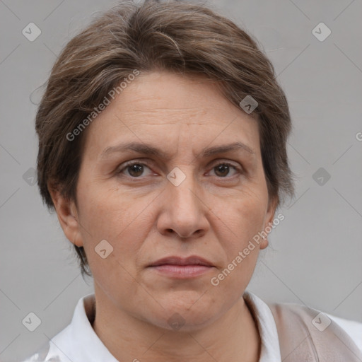 Joyful white adult female with short  brown hair and brown eyes