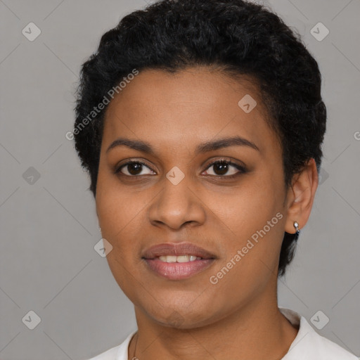 Joyful black young-adult female with short  brown hair and brown eyes