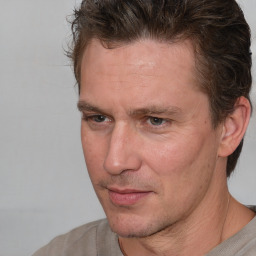 Neutral white adult male with short  brown hair and brown eyes