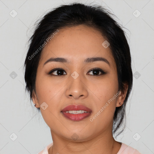 Joyful asian young-adult female with medium  black hair and brown eyes