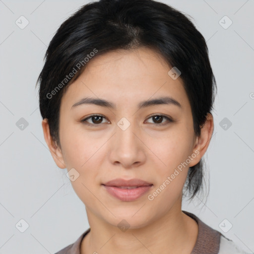 Joyful asian young-adult female with medium  black hair and brown eyes