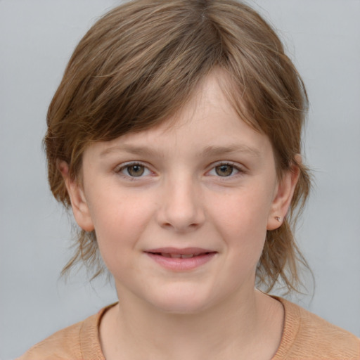 Joyful white child female with medium  brown hair and grey eyes