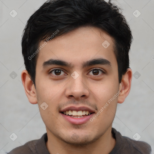 Joyful white young-adult male with short  black hair and brown eyes