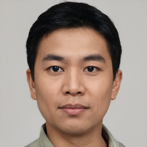 Neutral asian young-adult male with short  black hair and brown eyes