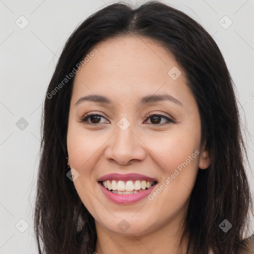 Joyful asian young-adult female with long  brown hair and brown eyes