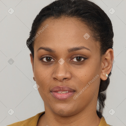 Joyful latino young-adult female with short  brown hair and brown eyes