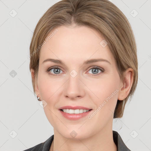 Joyful white young-adult female with medium  brown hair and grey eyes