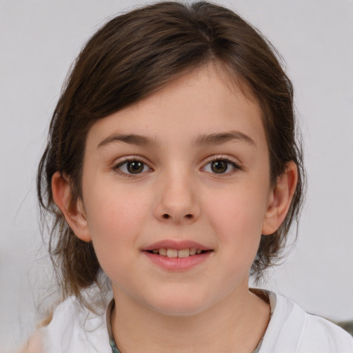 Joyful white child female with medium  brown hair and brown eyes