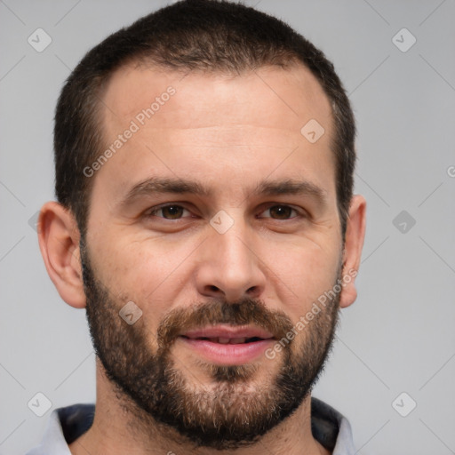 Joyful white adult male with short  brown hair and brown eyes