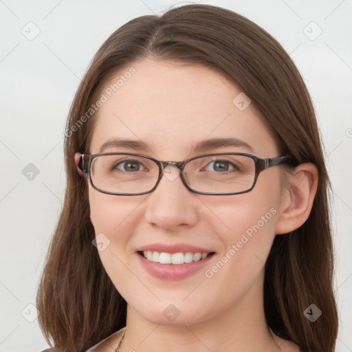 Joyful white young-adult female with long  brown hair and grey eyes