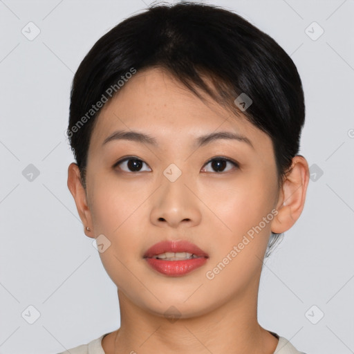 Joyful asian young-adult female with short  brown hair and brown eyes