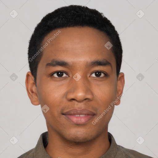 Joyful black young-adult male with short  black hair and brown eyes