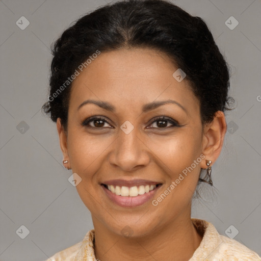 Joyful latino young-adult female with short  brown hair and brown eyes