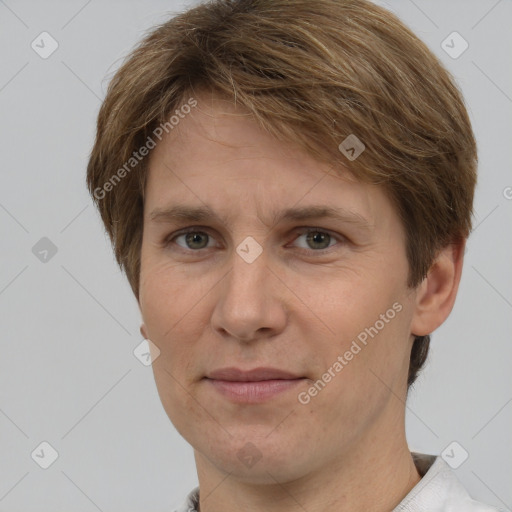 Joyful white adult female with short  brown hair and grey eyes