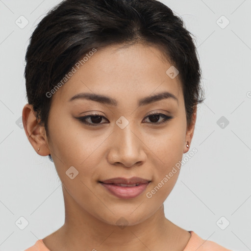 Joyful latino young-adult female with short  brown hair and brown eyes