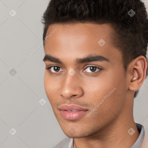 Neutral white young-adult male with short  black hair and brown eyes