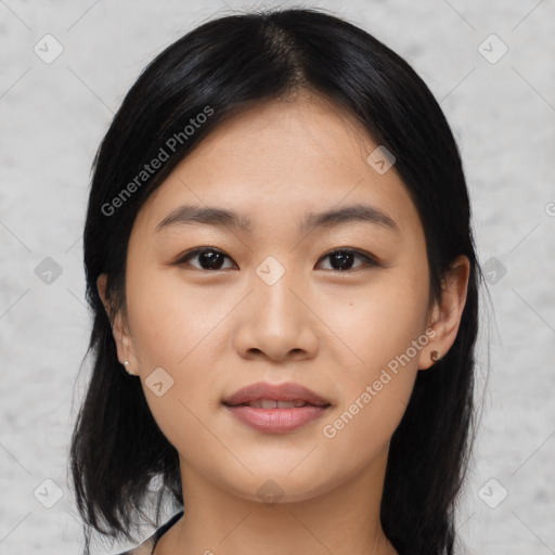 Joyful asian young-adult female with medium  black hair and brown eyes