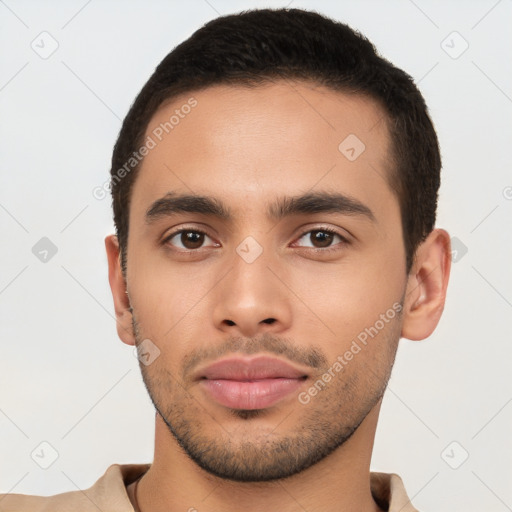 Neutral latino young-adult male with short  brown hair and brown eyes