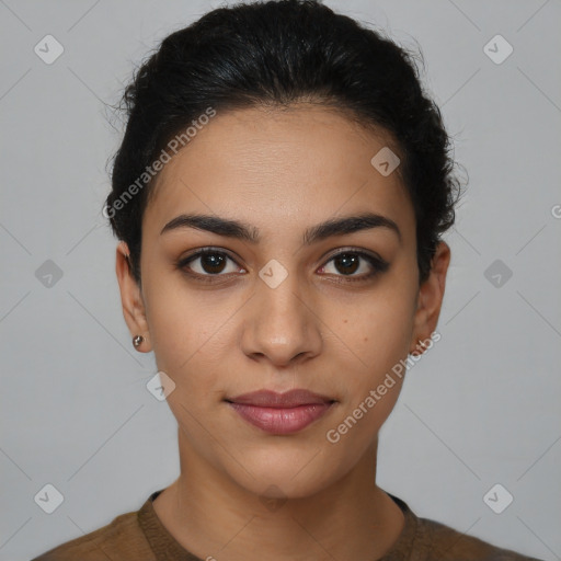 Joyful latino young-adult female with short  brown hair and brown eyes