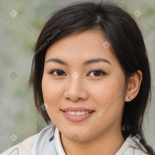 Joyful asian young-adult female with medium  brown hair and brown eyes