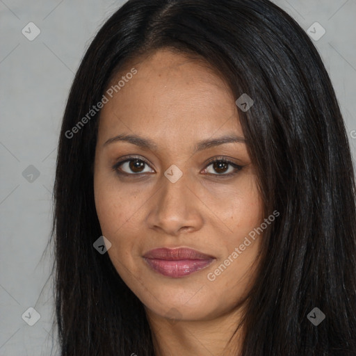 Joyful black young-adult female with long  black hair and brown eyes