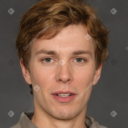 Joyful white adult male with short  brown hair and grey eyes