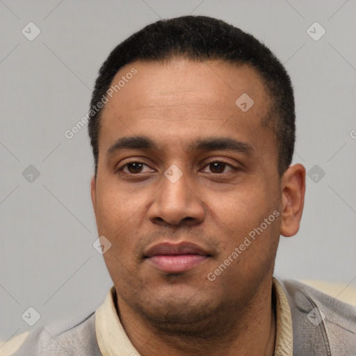 Neutral latino young-adult male with short  black hair and brown eyes