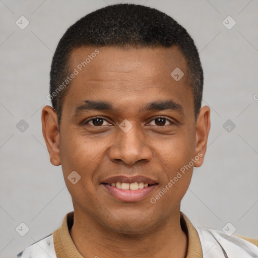 Joyful latino young-adult male with short  brown hair and brown eyes