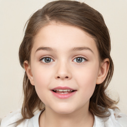 Joyful white child female with medium  brown hair and brown eyes