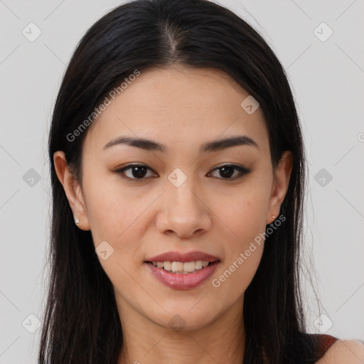 Joyful asian young-adult female with long  brown hair and brown eyes