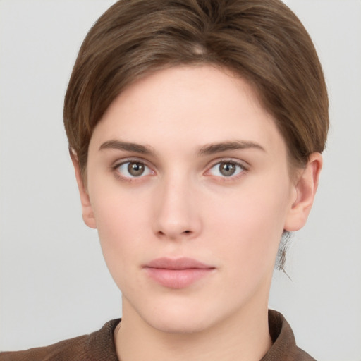 Neutral white young-adult female with short  brown hair and brown eyes