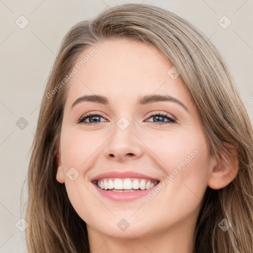 Joyful white young-adult female with long  brown hair and grey eyes