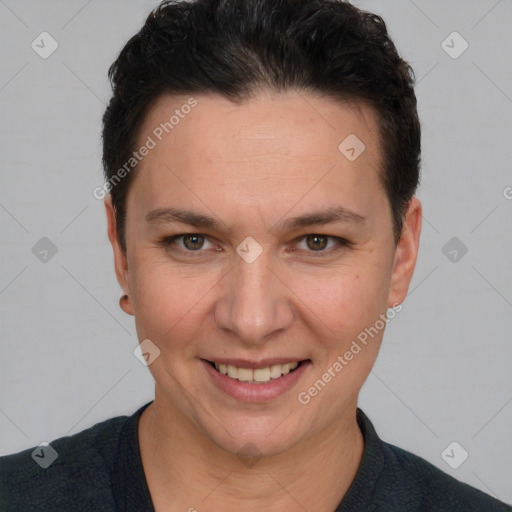 Joyful white adult female with short  brown hair and brown eyes