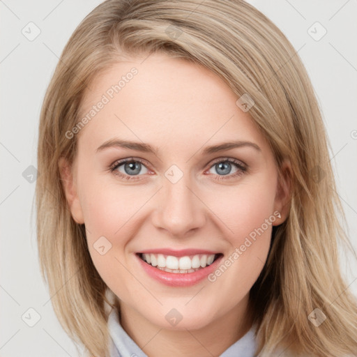 Joyful white young-adult female with medium  brown hair and blue eyes