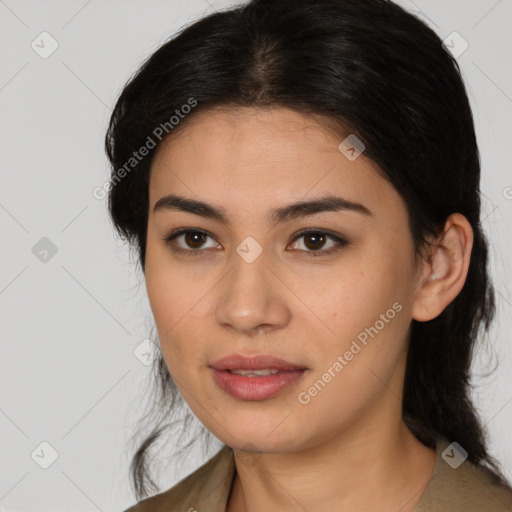 Joyful latino young-adult female with medium  brown hair and brown eyes