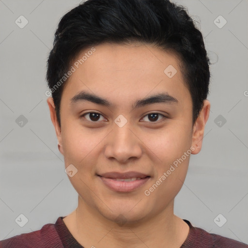 Joyful asian young-adult male with short  black hair and brown eyes