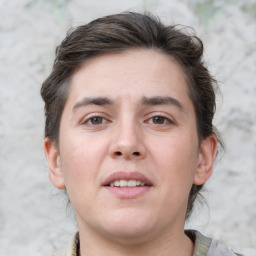 Joyful white young-adult male with medium  brown hair and brown eyes