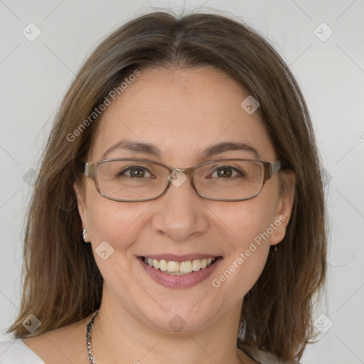 Joyful white adult female with medium  brown hair and brown eyes