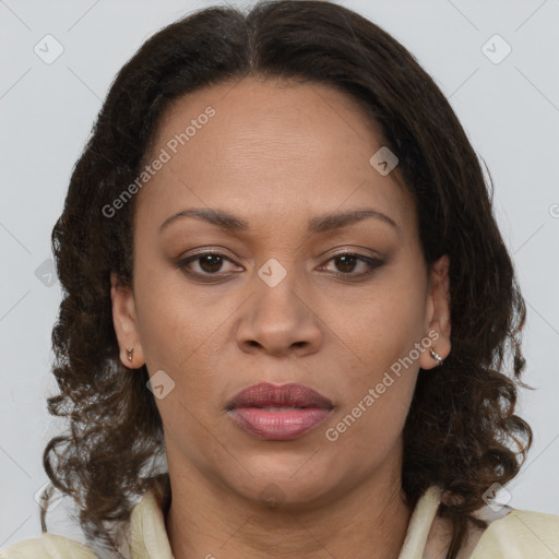 Joyful white adult female with medium  brown hair and brown eyes