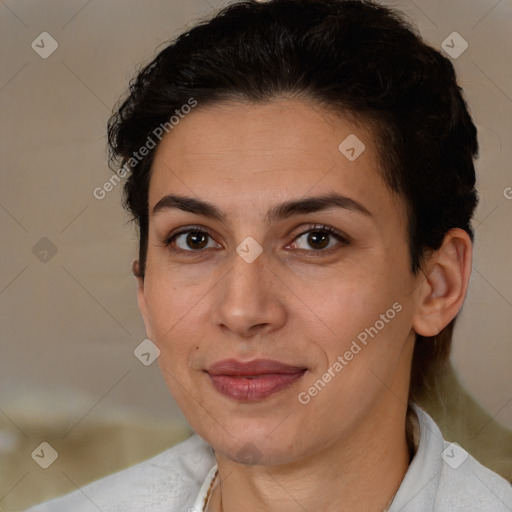 Joyful white adult female with short  brown hair and brown eyes